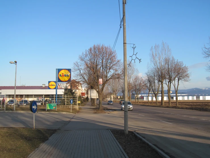 a parking area near a large gas station