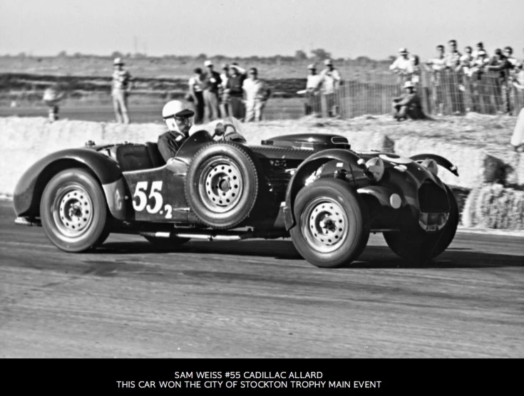 black and white pograph of an old race car