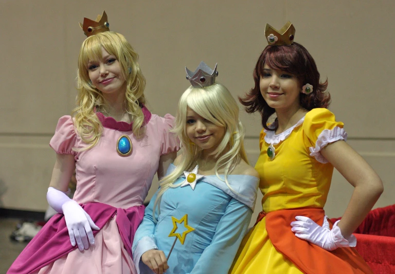 a group of young people standing together wearing costumes