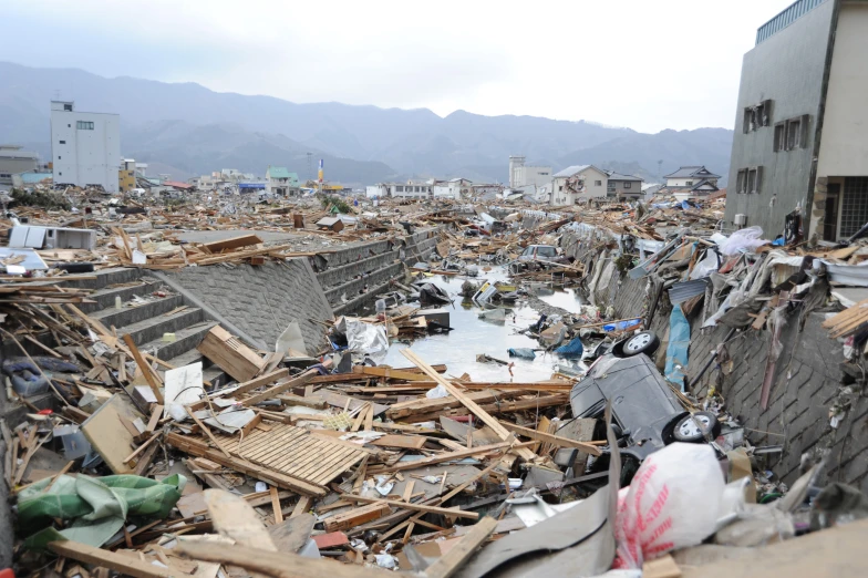 a bunch of debris in an alley that looks like it is being torn apart