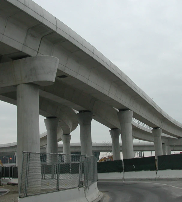 a po taken from the side of a road with multiple arches