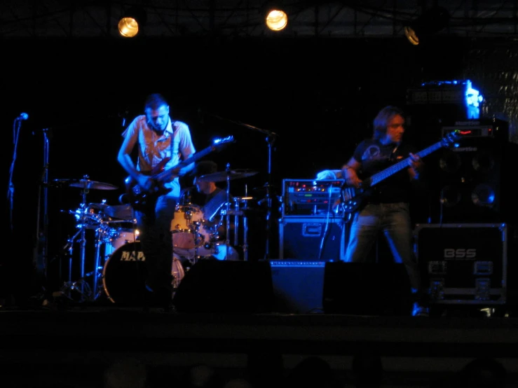 the band plays in the dark with its instruments