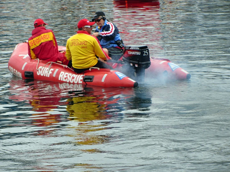 several people are in an inflatable boat