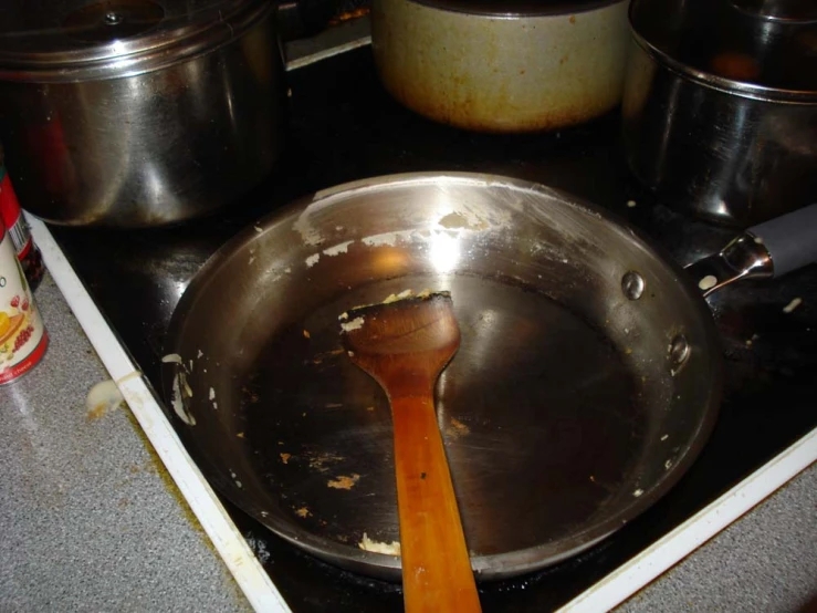 the lid of a pot is on the stove