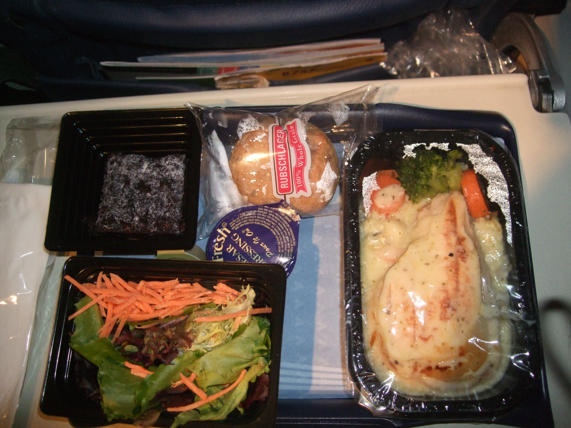 there are two plates of food on the plane