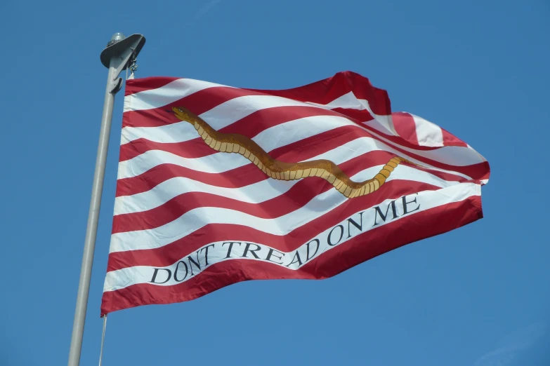 the flag of the united states flying in the wind