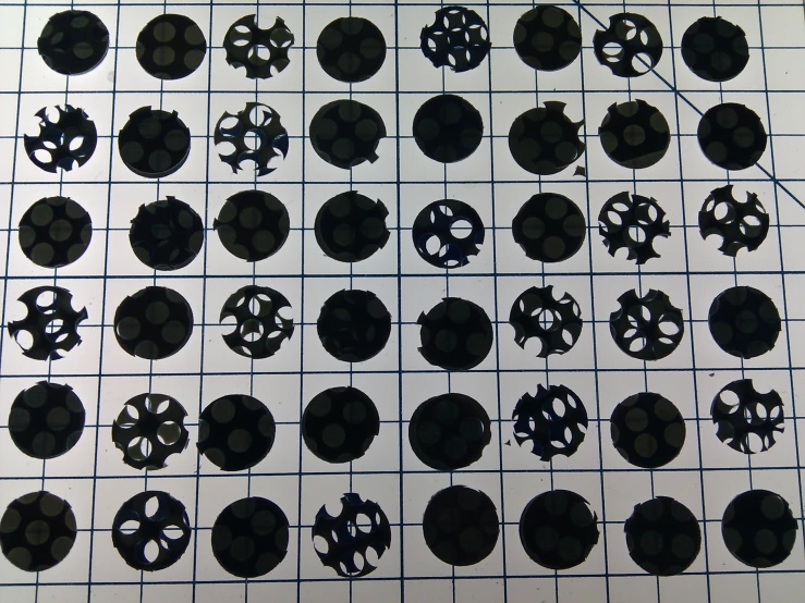 many circular discs and blades displayed on top of a chart