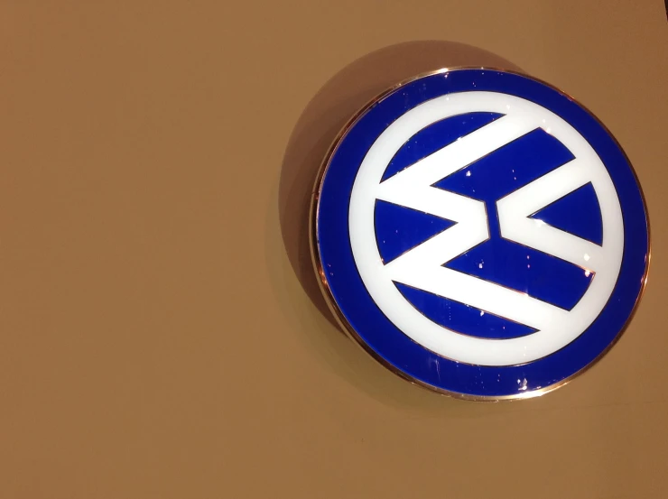 the volkswagen logo has a bright blue emblem