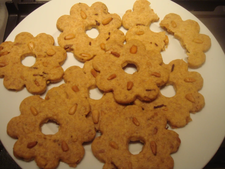 a white plate topped with ers shaped like animals