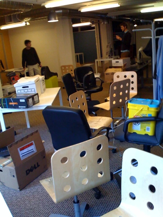 some office furniture is piled up and ready to be used