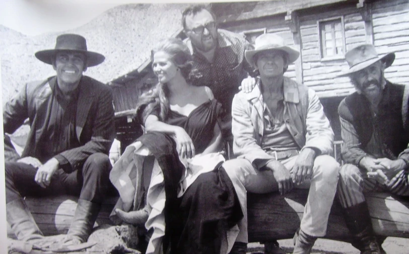 an old po shows a group of men in cowboy clothing