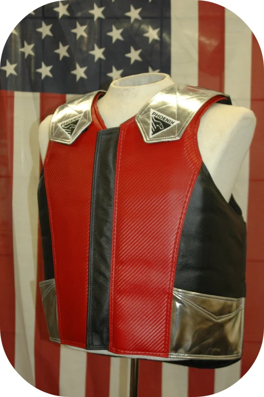 the red and black leather vest has a american flag