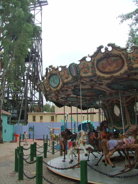 an image of a carousel on a park