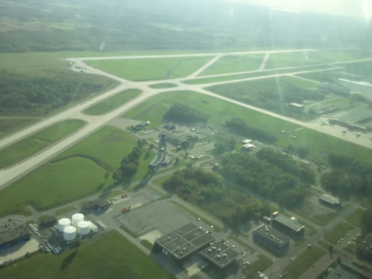 an aerial s of an industrial field near a highway