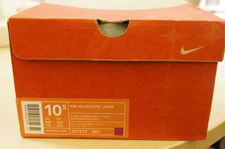 a box for nike has the name and date on it