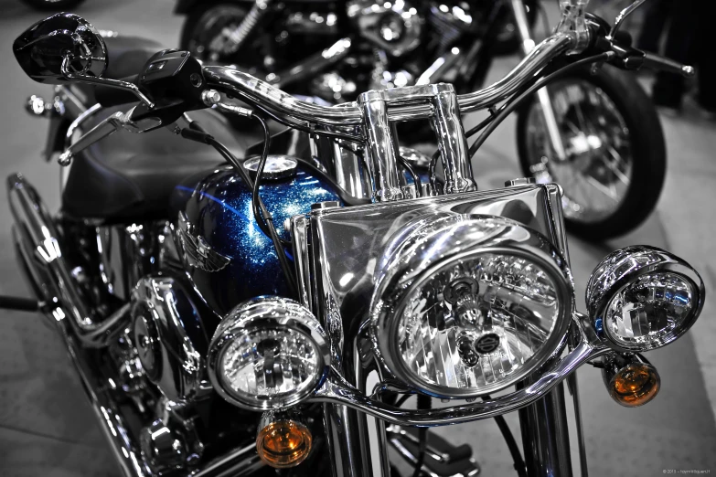 several chrome bikes with different colored lights