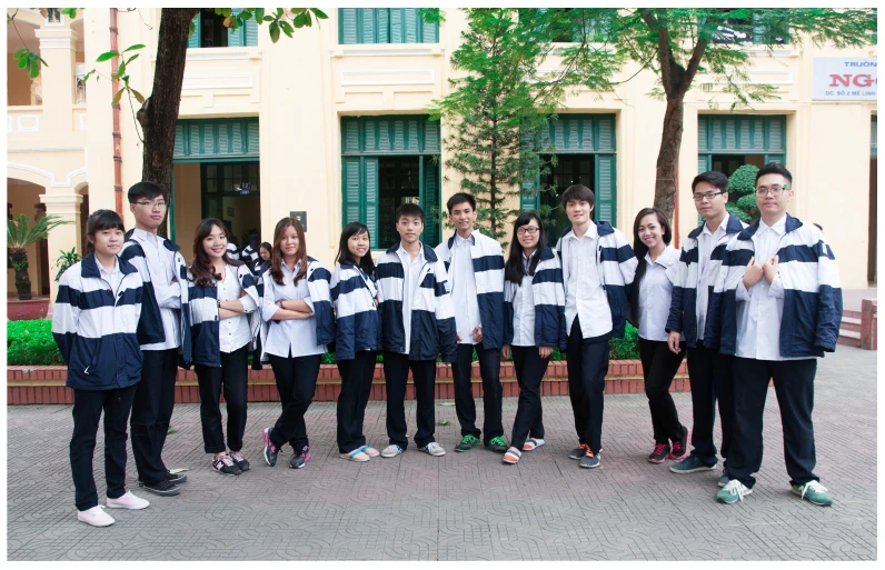 a group of young people standing next to each other