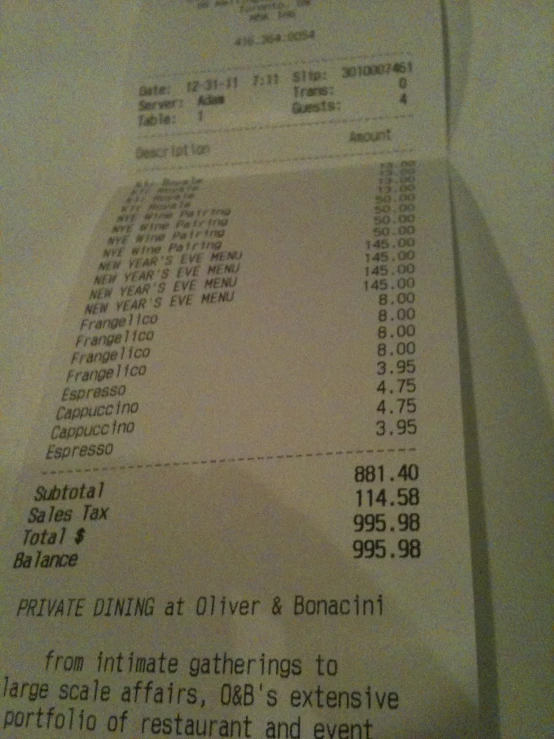 the receipt is being written to someone at a bar