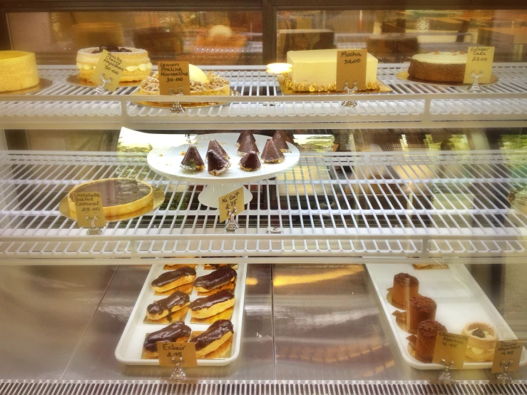 different types of desserts and pastries on display