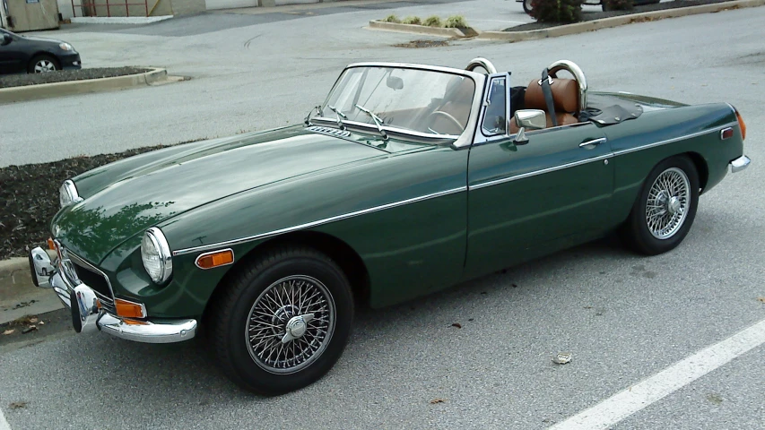 a vintage car in the middle of a road