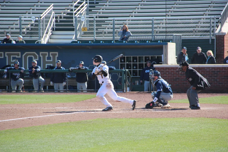 the baseball player has swung for a home run