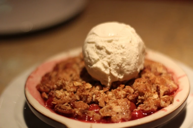 a plate filled with cake covered in ice cream