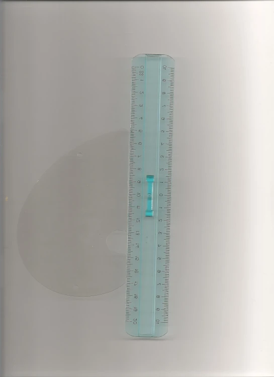 an item with a ruler that appears to have been measuring