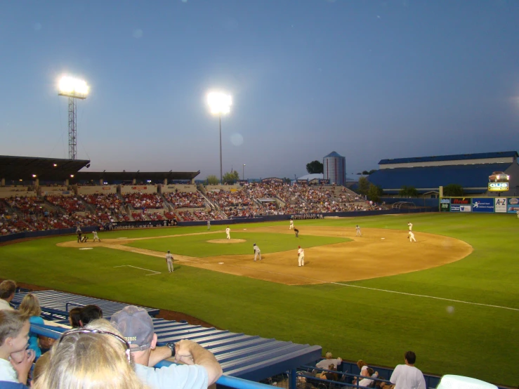 an empty baseball field with players on it