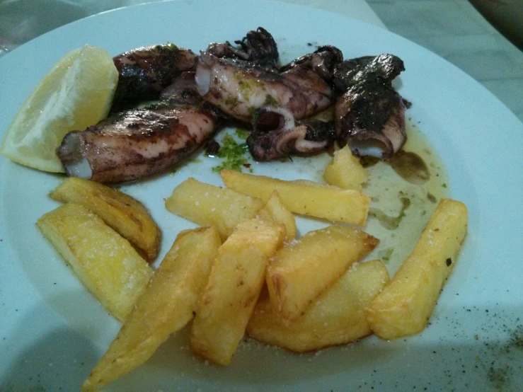 a plate of food with potatoes, chicken and broccoli