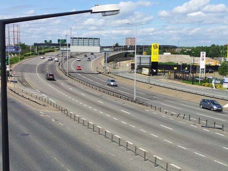 the intersection of two roads with a car and bus