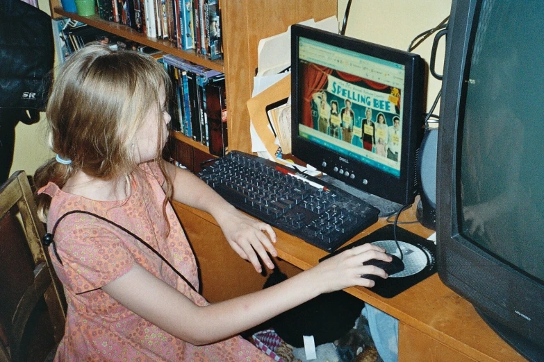 a  using a keyboard to play on the computer