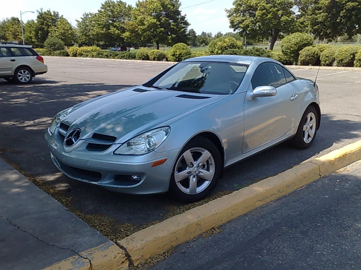 a mercedes cls is parked in the parking lot