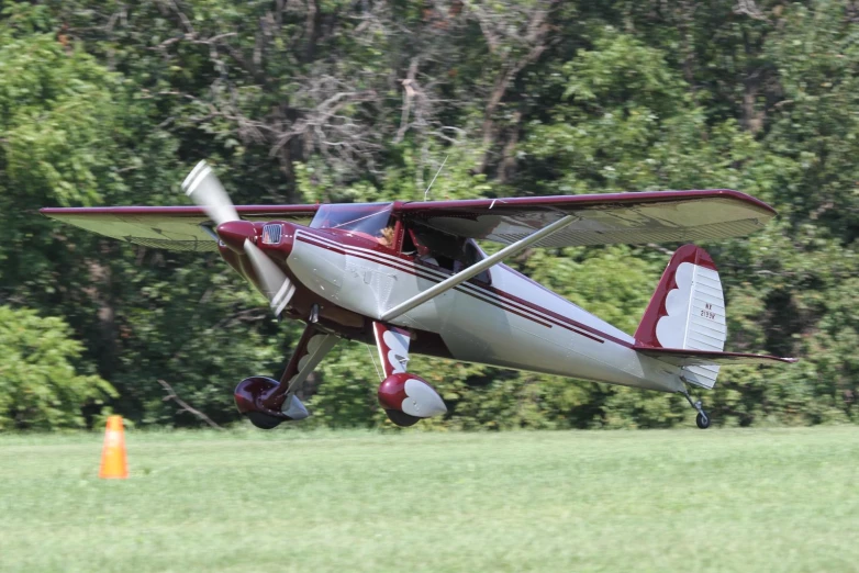 a small plane is taking off on the runway