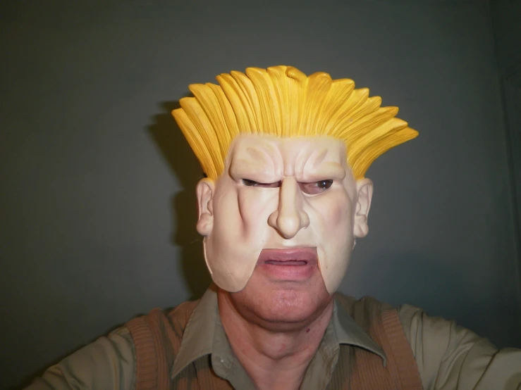 a man with blond hair and some scissors in his mouth