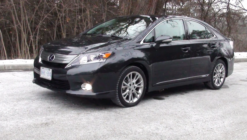 the 2013 toyota venzan is parked in a parking lot