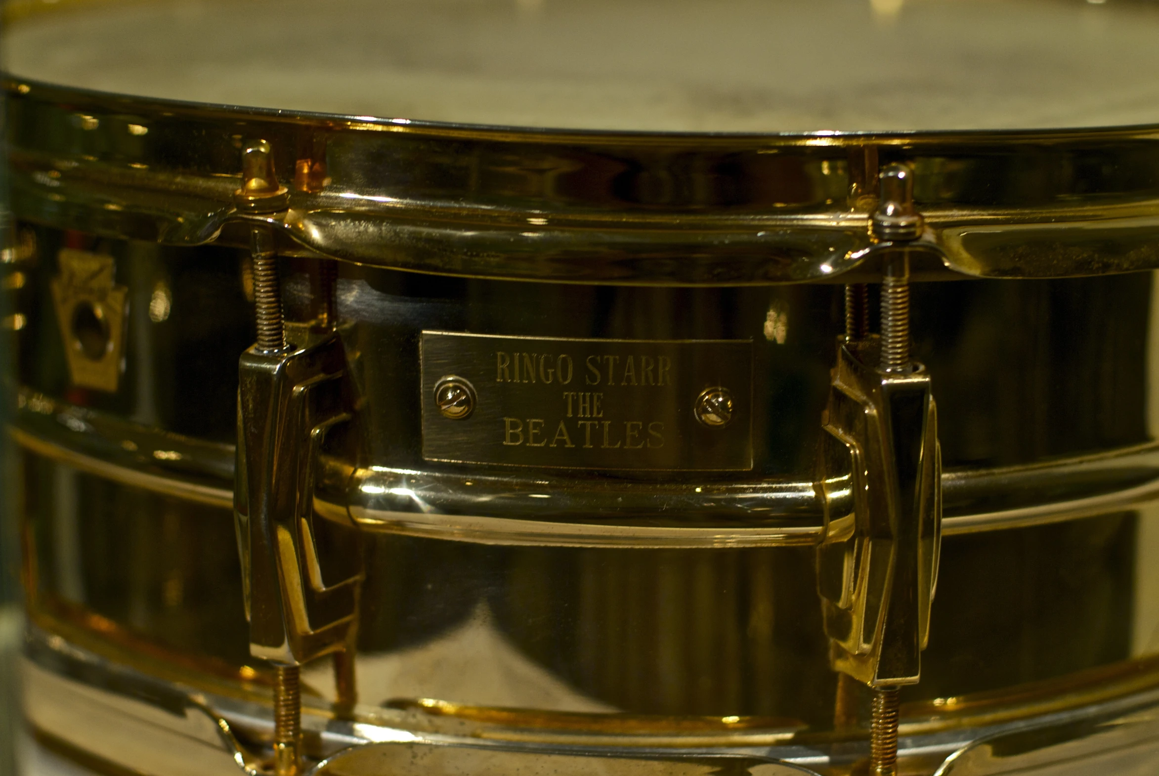 the front of a drum head sitting on a table