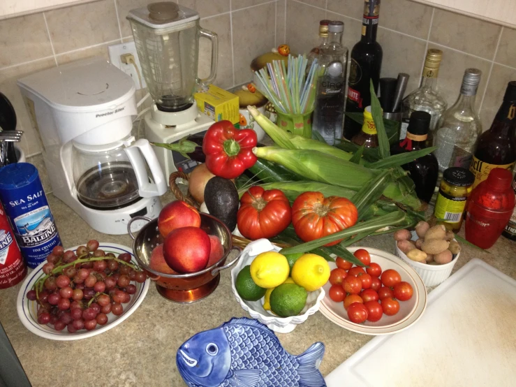 various fruits and vegetables on counter in home kitchen