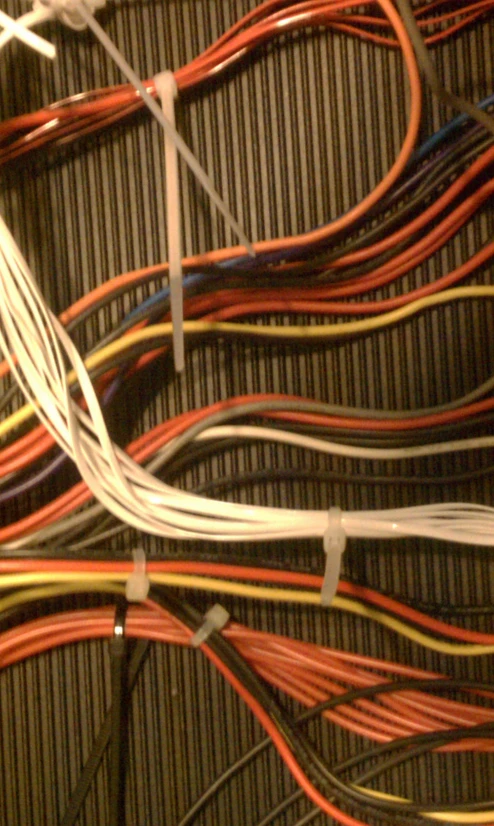 many wires with different colors on the bottom and side