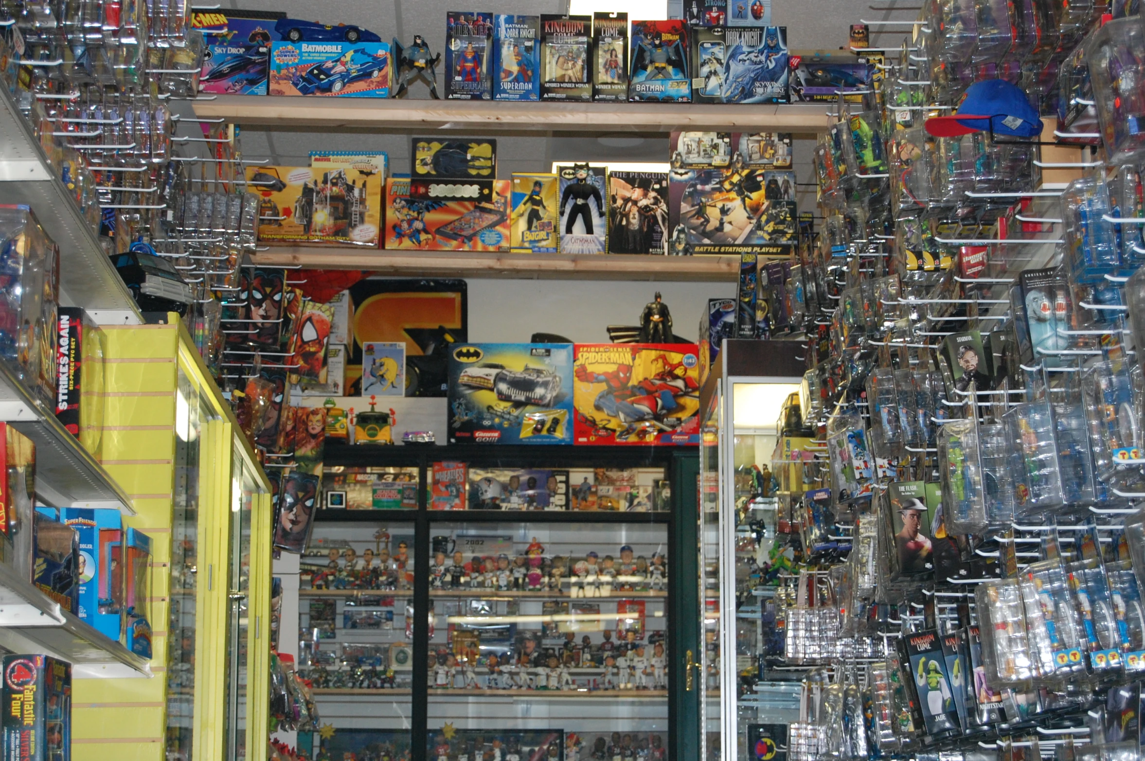 the inside of a toys and toy store filled with shelves