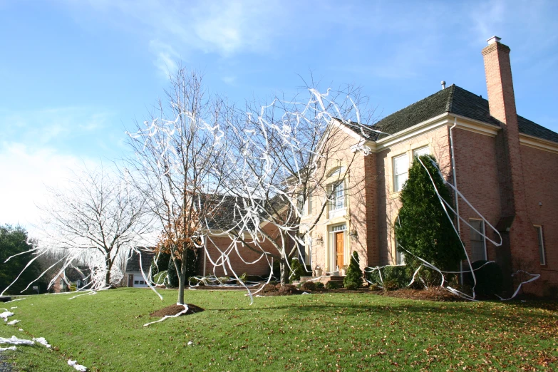 a house on the corner with some tape in front