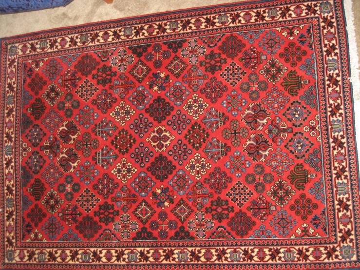 an old persian rug, possibly being taken from a second worldly object