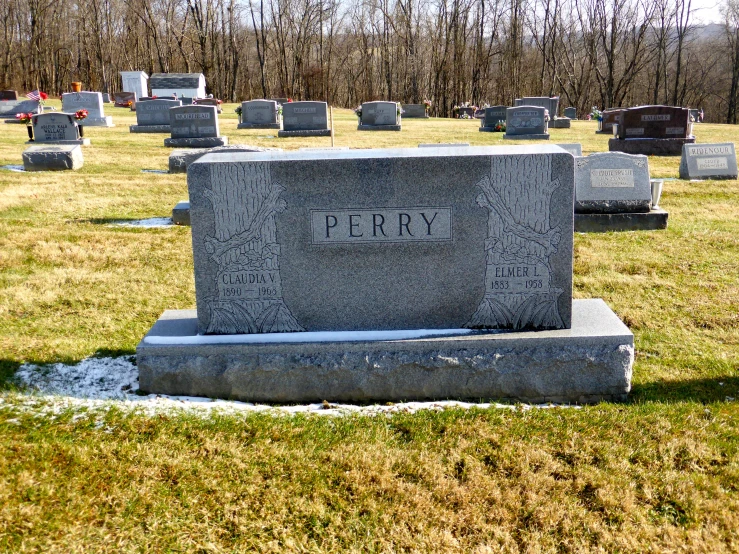 the headstones of several headstones at an old cemetery