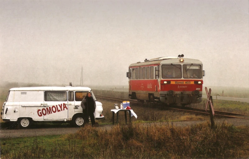 a bus and a truck are by the road