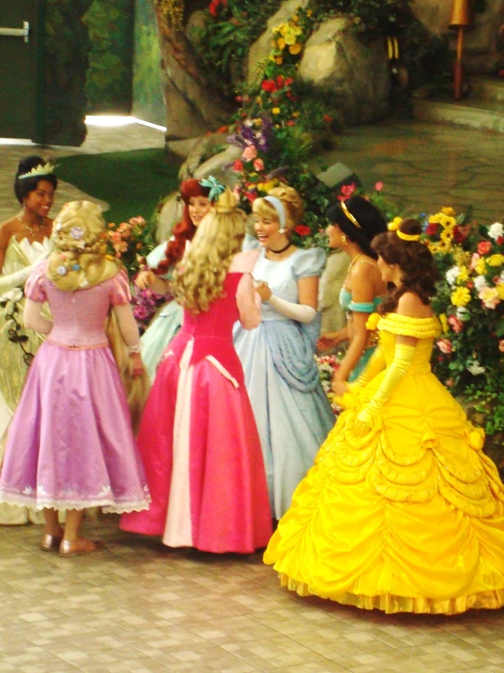 there are many s dressed up in princess costumes