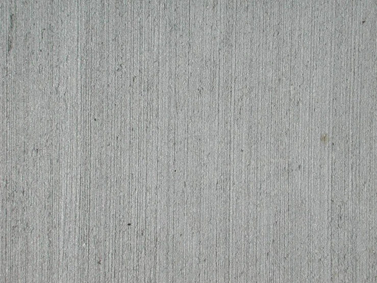 closeup of a carpet textured in white color with little black details