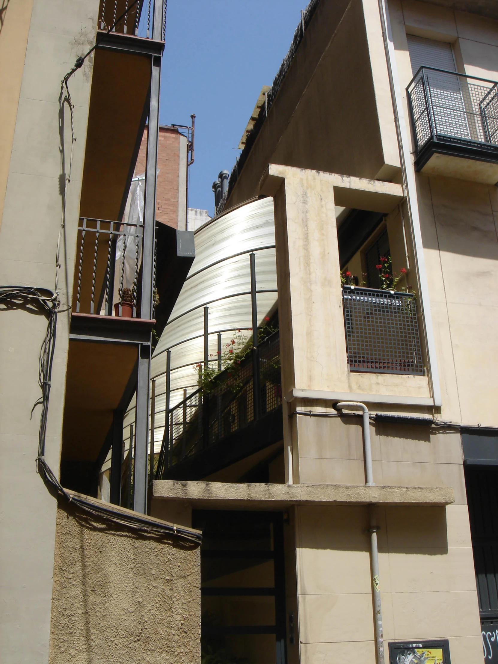 buildings with balconies and balconyes near one another