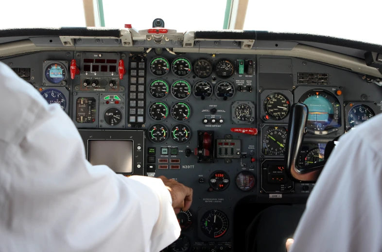 the cockpit of a small plane as it flies