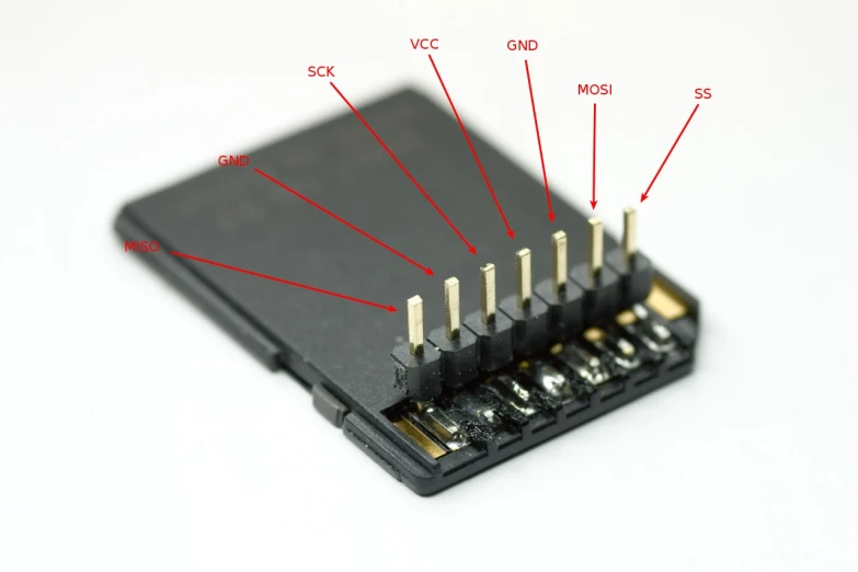 the inside of a micro board with many small wires connected