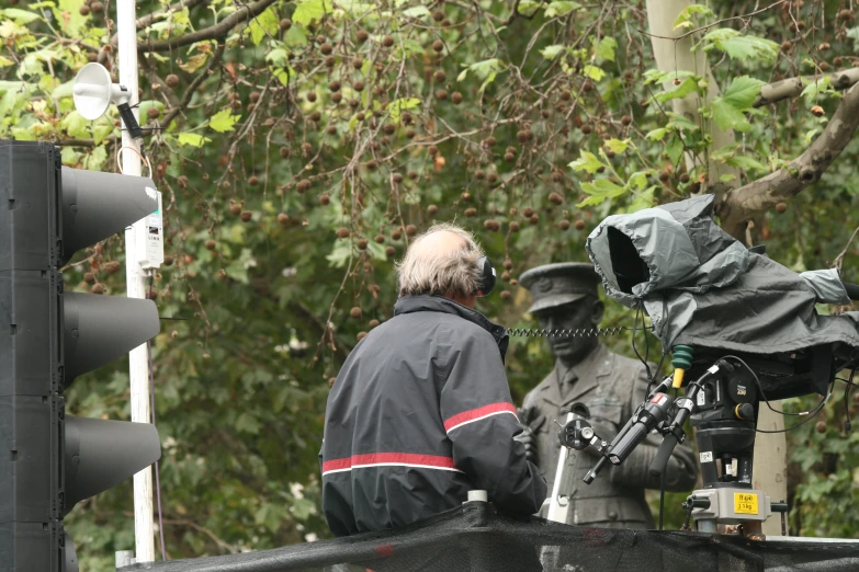 two men working on some sort of project in the city