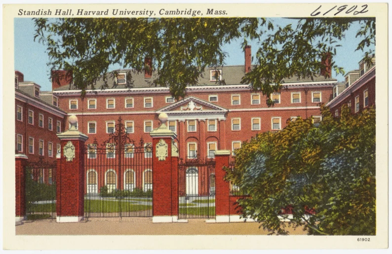 an old po of a building with gates and trees in front